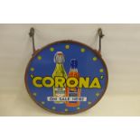 A Corona part pictorial double sided circular enamel sign in excellent condition, set within