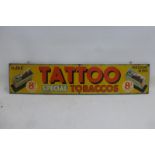 An unusual Tattoo Special Tobaccos part pictorial tin advertising sign, 27 x 5 3/4".
