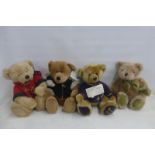 Four Harrods teddy bears: 1995, 2000, 2001 and 2003.