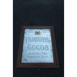 A Cadbury's Cocoa 'Absolutely pure therefore best' advertising mirror, set within an oak frame, 25