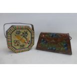 Two Lyons' Toffieskotch handbag shaped biscuit tins.