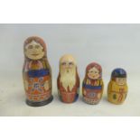 An early hand painted wooden Russian doll.
