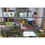 A collection of tobacco related tins and packaging.