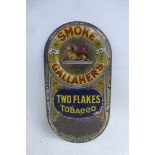 A rare Gallaher's Two Flakes Tobacco pictorial tin match striker, 3 3/4 x 7 1/4".