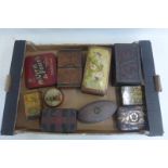 A quantity of assorted biscuit tins.
