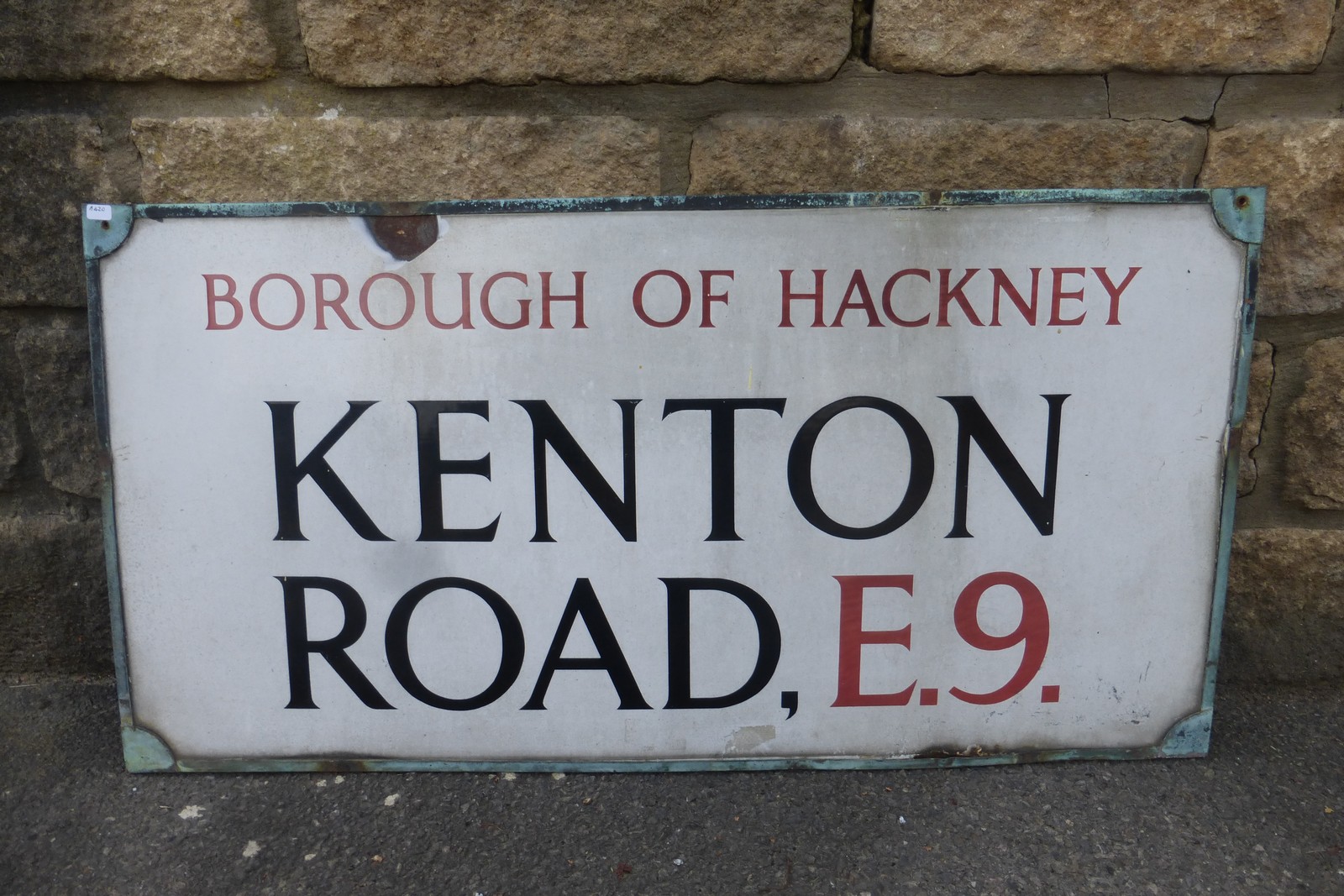 A Borough of Hackney Kenton Road E9 enamel street sign in brass frame, 2 1/4 x 16 1/2".