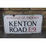 A Borough of Hackney Kenton Road E9 enamel street sign in brass frame, 2 1/4 x 16 1/2".