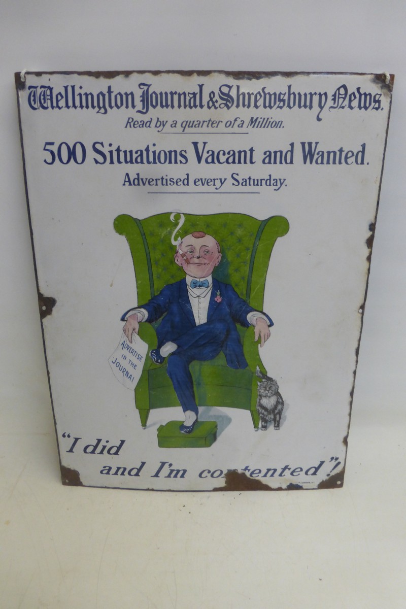 A Wellington Journal & Shrewsbury News pictorial enamel sign depicting a gentleman sat in a wingback