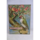 A Bullmer's Woodpecker Cider pictorial showcard depicting a woodpecker perched on the branch of an