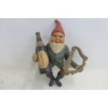 A Guinness advertising gnome figure.