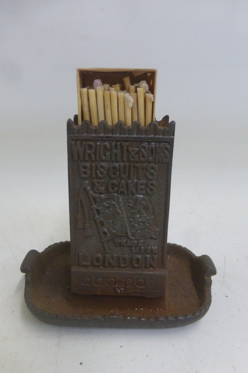 A Wright & Sons Biscuits and Cakes counter top match striker.