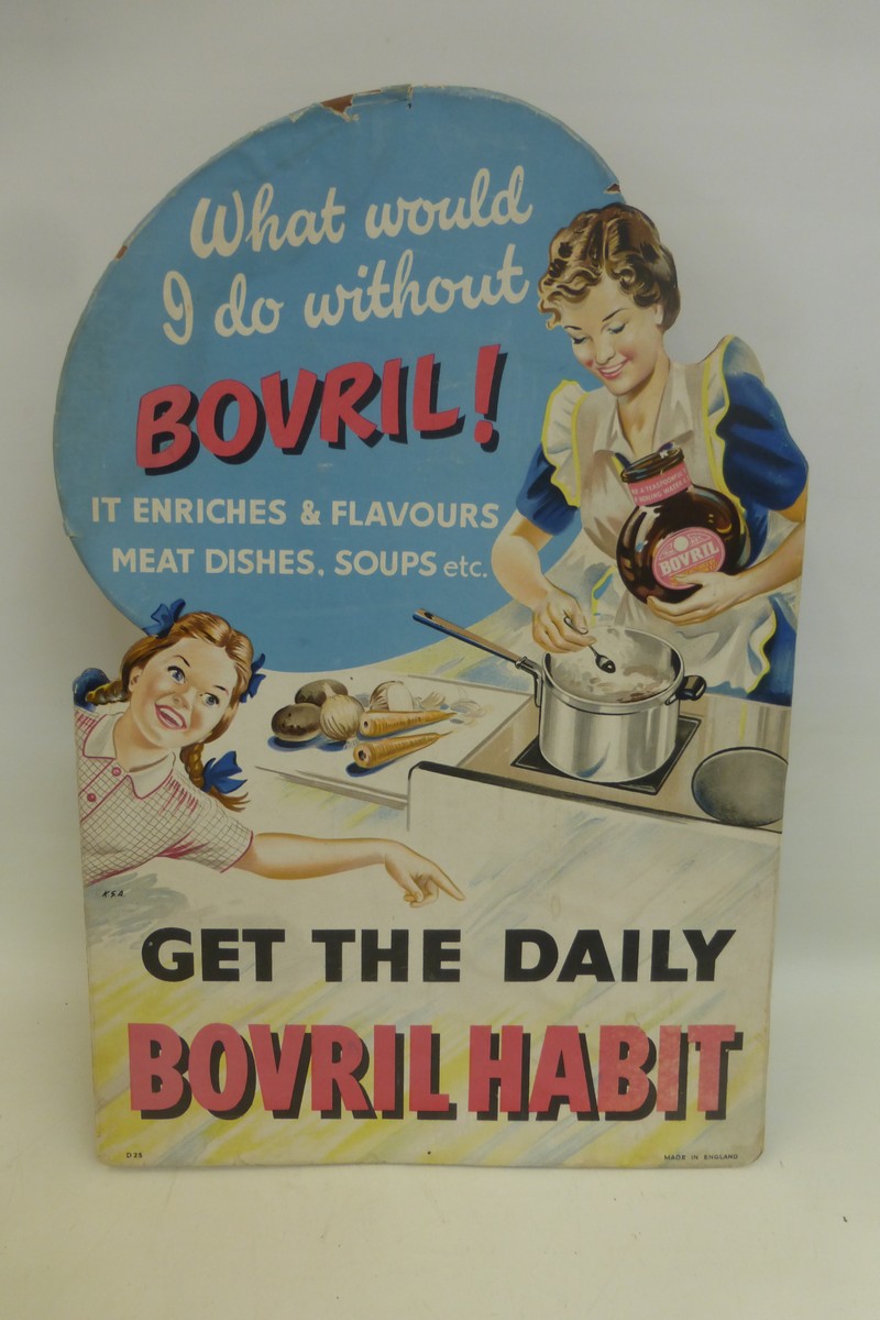 A Bovril die-cut showcard depicting a lady cooking, titled "What would I do without Bovril!" 14 x 20