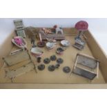 A collection of late Victorian/Edwardian and later dolls house furniture to include a range