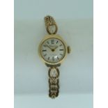 A 9ct gold Regency lady's Wristwatch, with Swiss 17-jewels movement and 9ct gold circular link