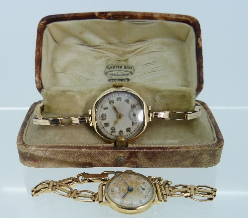 A 9ct gold lady's Wristwatch, with circular dial and 9ct gold expanding bracelet, cased, together