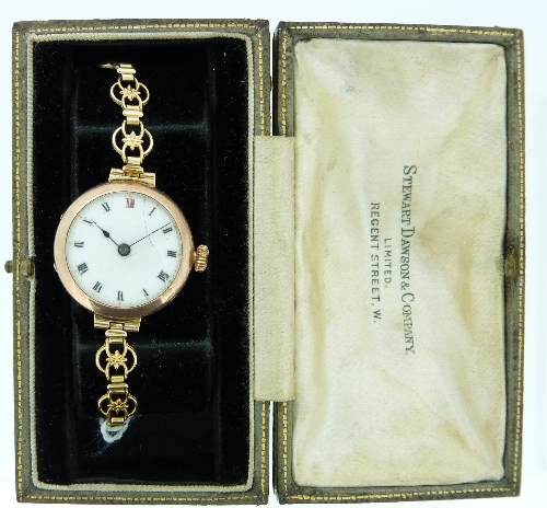 A 9ct gold lady's Wristwatch, with circular dial and rolled-gold pierced-link bracelet, cased.