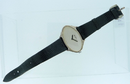 A silver Roy King gentleman's Wristwatch, of oval form, the dial signed 'Roy King', on black leather