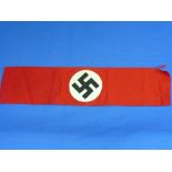 A WWII period German Nazi Armband, in red velvet with black swastika emblem, together with a vintage