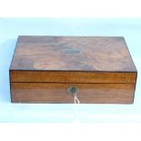 A Victorian walnut Work box, the top with brass inlaid plaque opening to reveal an interior with