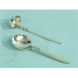 A Georg Jensen silver 'Cactus' pattern Cream Ladle, London import marks for 1931, 5in (13cm) long,