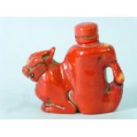 A Chinese Republic period red coral Snuff Bottle, circa early 20thC, carved in the form of a dragon,