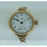 A 9ct gold Waltham lady's Wristwatch, the circular dial with Arabic numerals and subsidiary