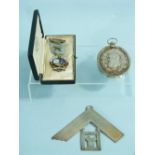 A George V silver Masonic Set Square Jewel, hallmarked London, 1917, 1.7g, together with a large and