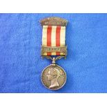 Indian Mutiny Medal, 1858, with Delhi clasp, inscribed to: Tp. Serj't Major Joseph Manttan, 6th