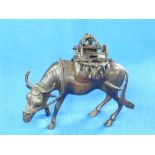 A 19thC Japanese bronze Incense Burner, in the form of a buffalo with saddle and panniers, lacks