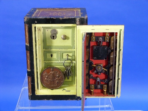 A Victorian cast-iron miniature Safe, by R. Thompson, of traditional upright rectangular form with - Image 5 of 7