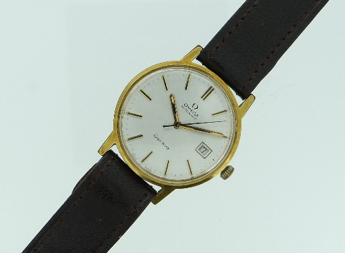 A vintage Omega Automatic Genéve gentleman's Wristwatch, on brown leather strap.