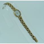 A 9ct gold Marvin lady's Wristwatch, with 9ct gold gate-link bracelet, and a 9ct gold lady's