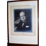 Winston Churchill; a photograph signed ("W.S. Churchill") on the mount, showing Churchill at the