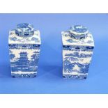 A pair of Mailings Ringtons Tea Caddies and covers, transfer printed in blue and white with Willow