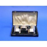 An attractive George VI five piece cased silver Cruet Set, by A.C.Bloxham Ltd., hallmarked
