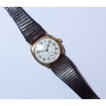 A vintage 9ct gold J. W. Benson gentleman's Wristwatch, with Swiss 16-jewels movement, the cushion