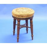 An early 19thC circular mahogany Stool, the upholstered top upon four reeded and turned legs, 14½