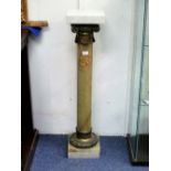 A decorative green onxy Column, the top with gilt metal Ionic style capital and brass fitting