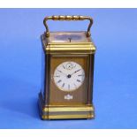 A 19thC French gilt-brass repeating Carriage Clock, of five-glass form with hinged handle, signed