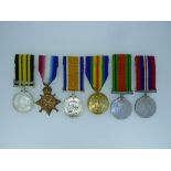 A group of six medals, awarded to H. Dines R.N., comprising an Africa General Service medal, with