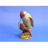 A Beswick pottery Woodpecker, M.N.1218, no flowers on base, gloss, 8¾in (22.25cm) high.