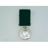 A Volunteer Long Service medal, 1894, to "Sergeant R. Henderson 25 Years 5 Months", with ribbon.