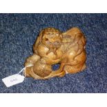 A late 19thC Chinese carved soap stone Foo Dog, 5½in (14cm) wide.