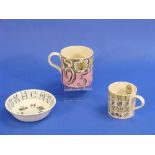 A Wedgwood 1953 Coronation Mug, designed by Eric Ravilious, 4in (10.2cm) high, together with a