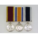 A group of three medals, awarded to T. J. C. Beard, Royal Navy, comprising a China War medal 1900,