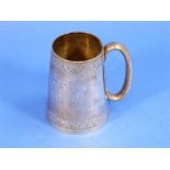 A Victorian silver Mug, by Martin Hall & Co., hallmarked London, 1884, of plain tapering form, the
