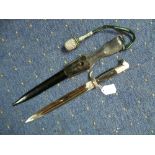 A W.W.2 period German Army Dress bayonet, with steel sheath, leather frog and sword knot, the 9?