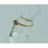 A single stone diamond Ring, c.¼ct., all mounted in yellow metal, marks indecipherable, Size M½.