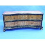 An 18thC Italian Baroque style walnut, fruitwood and ebonised Chest of Drawers, with ivory inlays,