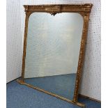 A 19thC gilt-wood framed large Overmantel Mirror, the arched rectangular frame decorated with